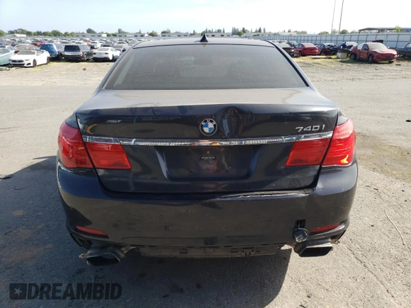 2012 BMW 7 Series 740i with VIN WBAKA4C54CC613419, listed as a Copart auction lot 54420885 with 104,006 mi miles and Salvage Title. Bid and sale history available at DreamBid. Image 6.