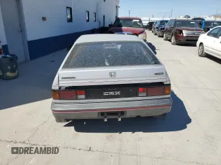 1987 Honda Civic z VIN JHMEC1327HS029350, wystawiony jako Copart lot #71452054 z przebiegiem 356 810 mil mil oraz Szkody całkowita. Historia ofert i sprzedaży dostępna na DreamBid. Obrazek 6.