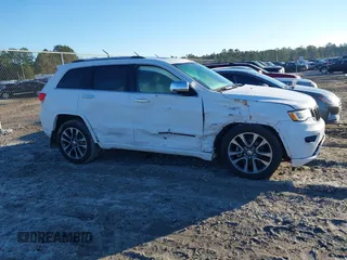 2017 Jeep Grand Cherokee Overland with VIN 1C4RJFCG8HC641729, listed as a IAAI auction lot 41233125 with 116,874 mi miles. Bid and sale history available at carsss.com. Image 13.