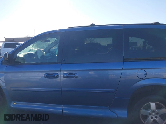 2007 Dodge Grand Caravan SXT with VIN 2D4GP44LX7R313906, listed as a IAAI auction lot 41402653 with 82,315 mi miles and . Bid and sale history available at DreamBid. Image 14.