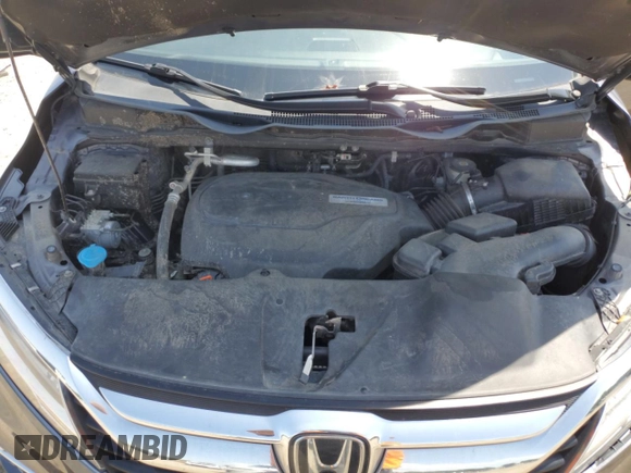 2019 Honda Odyssey Elite с VIN 5FNRL6H99KB119478, выставлен на аукционе Copart как лот 57094355 с пробегом 118 868 миль миль и Списание • Salvage title. История ставок и продаж доступна на DreamBid. Изображение 12.