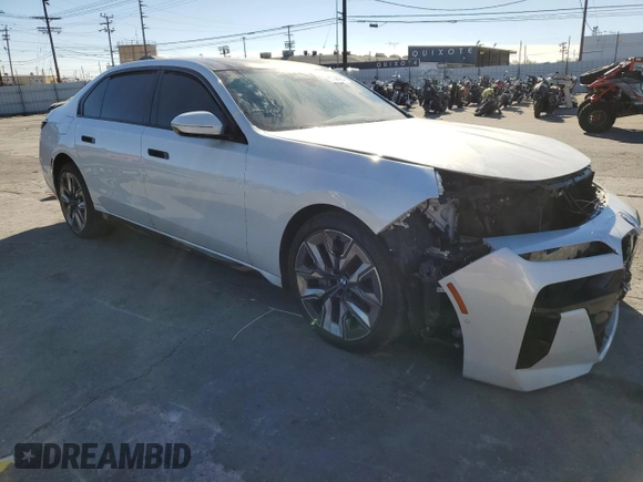 2023 BMW 7 Series 740i with VIN WBA23EH03PCM72085, listed as a Copart auction lot 87090954 with 0 mi miles and Salvage Title. Bid and sale history available at carsss.com. Image 4.