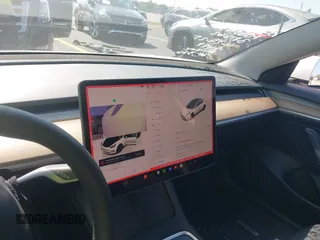 2023 Tesla Model 3 with VIN 5YJ3E1EA0PF548498, listed as a IAAI auction lot 42334326 with 17,674 mi miles and . Bid and sale history available at DreamBid. Image 19.