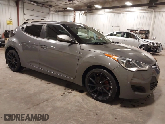 2016 Hyundai Veloster with VIN KMHTC6ADXGU272594, listed as a IAAI auction lot 42437409 with 91,620 mi miles and . Bid and sale history available at DreamBid. Image 1.