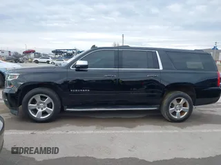 2019 Chevrolet Suburban Premier with VIN 1GNSKJKC7KR261826, listed as a IAAI auction lot 41652451 with 127,032 mi miles and . Bid and sale history available at DreamBid. Image 14.