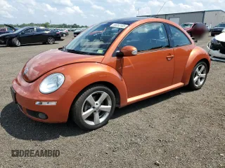 2010 Volkswagen Beetle with VIN 3VWRG3AG7AM036330, listed as a Copart auction lot 63053105 with 69,821 mi miles and Salvage title. Bid and sale history available at DreamBid. Image 1.