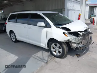 2014 Toyota Sienna LE AAS with VIN 5TDKK3DC2ES513425, listed as a IAAI auction lot 42107820 with 367,844 mi miles. Bid and sale history available at carsss.com. Image 1.