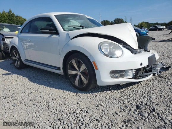 2012 Volkswagen Beetle 2.0T Turbo w/Sun/Sound PZEV with VIN 3VWVA7AT9CM612734, listed as a Copart auction lot 69196224 with 0 mi miles and Salvage Title. Bid and sale history available at carsss.com. Image 4.