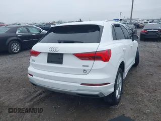 2020 Audi Q3 Premium with VIN WA1AECF35L1030273, listed as a IAAI auction lot 42006553 with 81,944 mi miles. Bid and sale history available at carsss.com. Image 4.