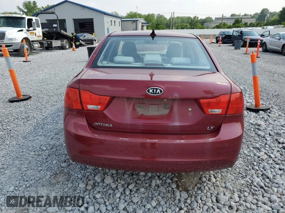 2009 Kia Optima LX z VIN KNAGE228795334599, wystawiony jako Copart lot #59276515 z przebiegiem 180 399 mil mil oraz Szkoda całkowita • Salvage title. Historia ofert i sprzedaży dostępna na DreamBid. Obrazek 6.