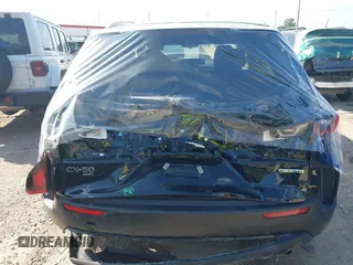 2025 Mazda CX-50 S Preferred z VIN 7MMVABBMXSN337974, wystawiony jako IAAI lot #42238129 z przebiegiem 6 159 mil mil oraz . Historia ofert i sprzedaży dostępna na DreamBid. Obrazek 6.