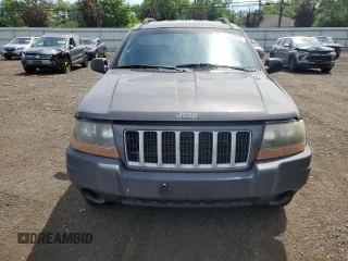 2004 Jeep Grand Cherokee Laredo with VIN 1J4GW48S64C291404, listed as a Copart auction lot 62835335 with 170,365 mi miles and Salvage title. Bid and sale history available at DreamBid. Image 5.