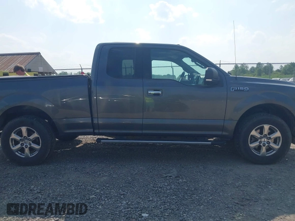 2018 Ford F-150 XL with VIN 1FTFX1E58JFD92806, listed as a IAAI auction lot 42424589 with 144,476 mi miles and . Bid and sale history available at DreamBid. Image 13.
