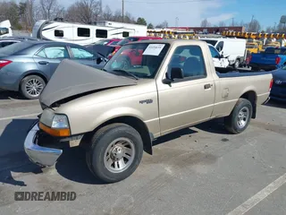 1999 Ford Ranger XL with VIN 1FTYR10V1XTA41899, listed as a IAAI auction lot 41654635 with 150,444 mi miles. Bid and sale history available at carsss.com. Image 2.