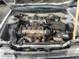 1992 Toyota Corolla z VIN 1NXAE91A1NZ346555, wystawiony jako Copart lot #37697334 z przebiegiem 232 988 mil mil oraz Szkoda całkowita • Salvage title. Historia ofert i sprzedaży dostępna na DreamBid. Obrazek 11.