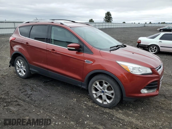 2015 Ford Escape Titanium z VIN 1FMCU9J92FUC37234, wystawiony jako Copart lot #57681855 z przebiegiem 96 973 mil mil oraz Szkoda całkowita • Salvage title. Historia ofert i sprzedaży dostępna na DreamBid. Obrazek 4.