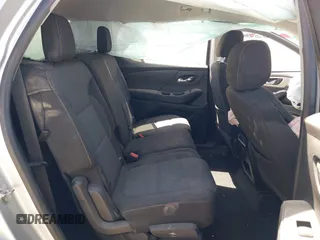 2018 Chevrolet Traverse LT Cloth z VIN 1GNERGKW3JJ173973, wystawiony jako IAAI lot #41860647 z przebiegiem 143 854 mil mil oraz . Historia ofert i sprzedaży dostępna na DreamBid. Obrazek 8.