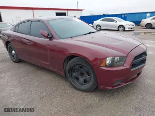 2013 Dodge Charger Police with VIN 2C3CDXAT8DH521766, listed as a IAAI auction lot 41809883 with 192,801 mi miles. Bid and sale history available at carsss.com. Image 1.