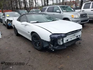 2002 Chevrolet Camaro Z28 z VIN 2G1FP22G222151301, wystawiony jako IAAI lot #41795113 z przebiegiem 164 931 mil mil oraz . Historia ofert i sprzedaży dostępna na DreamBid. Obrazek 1.