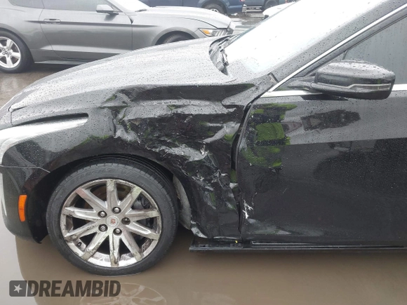 2014 Cadillac CTS Luxury AWD with VIN 1G6AX5SX3E0156938, listed as a IAAI auction lot 41574318 with 151,585 mi miles and . Bid and sale history available at DreamBid. Image 6.