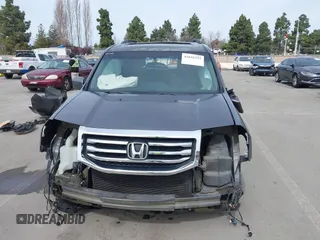 2015 Honda Pilot Touring with VIN 5FNYF3H91FB011847, listed as a IAAI auction lot 41841293 with 99,431 mi miles. Bid and sale history available at carsss.com. Image 13.