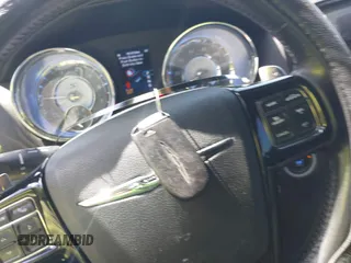 2012 Chrysler 300 S with VIN 2C3CCABG2CH155173, listed as a IAAI auction lot 41941875 with 191,313 mi miles and . Bid and sale history available at DreamBid. Image 11.