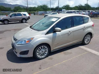 2018 Ford C-Max Hybrid SE with VIN 1FADP5AU7JL105118, listed as a IAAI auction lot 42085019 with 71,019 mi miles. Bid and sale history available at carsss.com. Image 2.