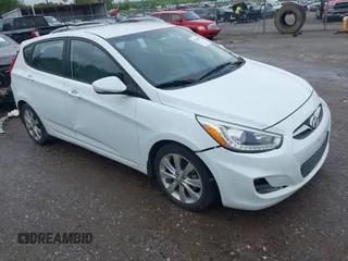 2014 Hyundai Accent SE z VIN KMHCU5AE3EU163889, wystawiony jako IAAI lot #42204941 z przebiegiem 112 244 mil mil oraz . Historia ofert i sprzedaży dostępna na DreamBid. Obrazek 1.
