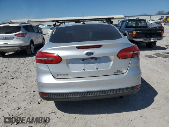 2016 Ford Focus SE with VIN 1FADP3F24GL267194, listed as a Copart auction lot 48812385 with 154,466 mi miles and Salvage Title. Bid and sale history available at carsss.com. Image 6.