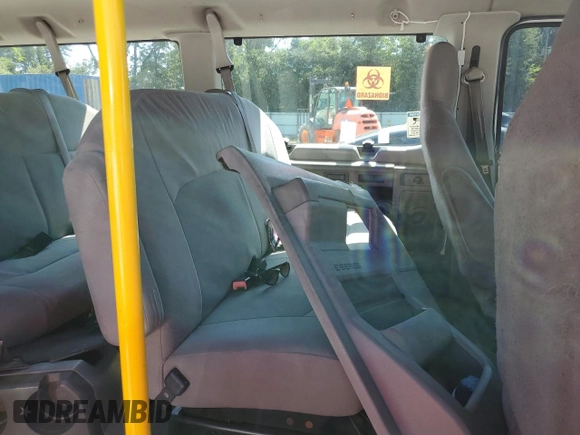 2012 Ford Econoline Passenger XL with VIN 1FBSS3BL1CDA35627, listed as a Copart auction lot 57001114 with Not Provided miles and Salvage Title. Bid and sale history available at DreamBid. Image 11.