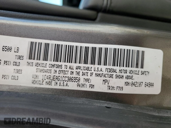 2012 Jeep Grand Cherokee Laredo with VIN 1C4RJEAG1CC306950, listed as a Copart auction lot 84912434 with 128,659 mi miles and Salvage Title. Bid and sale history available at carsss.com. Image 13.