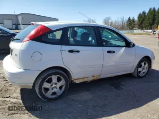 2004 Ford Focus with VIN 3FAFP37Z74R121213, listed as a Copart auction lot 53339645 with 65,590 mi miles and Clean title. Bid and sale history available at DreamBid. Image 3.