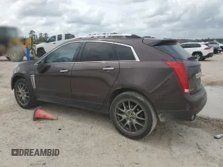 2015 Cadillac SRX Performance Collection with VIN 3GYFNCE38FS571733, listed as a Copart auction lot 54946215 with 147,343 mi miles and Salvage title. Bid and sale history available at DreamBid. Image 2.