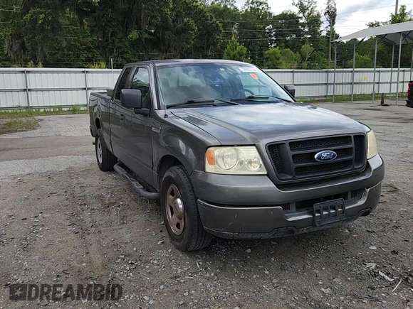 2005 Ford F-150 STX with VIN 1FTRX12W55FB32573, listed as a Copart auction lot 59602715 with 238,701 mi miles and Salvage title. Bid and sale history available at DreamBid. Image 13.