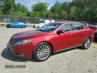 2015 Lincoln MKS z VIN 1LNHL9DK5FG607422, wystawiony jako Copart lot #55613525 z przebiegiem 164 590 mil mil oraz Szkoda całkowita • Salvage title. Historia ofert i sprzedaży dostępna na DreamBid. Obrazek 1.