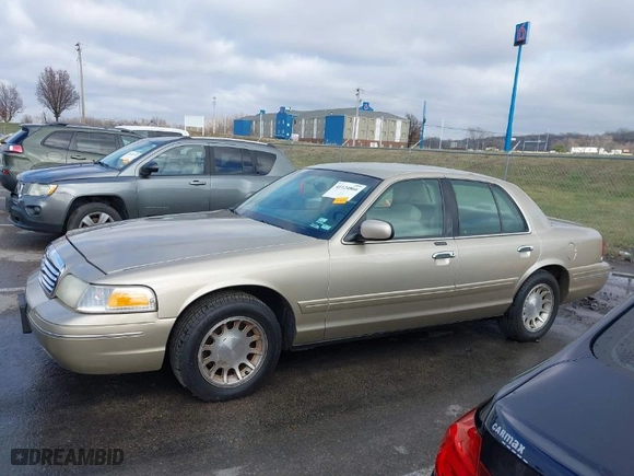 1999 Ford Crown Victoria LX with VIN 2FAFP74W0XX179512, listed as a IAAI auction lot 41124866 with 101,282 mi miles. Bid and sale history available at carsss.com. Image 14.