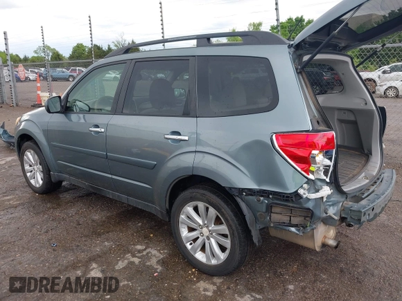 2012 Subaru Forester X Premium with VIN JF2SHADC8CH466939, listed as a IAAI auction lot 42092652 with 122,833 mi miles and . Bid and sale history available at DreamBid. Image 3.