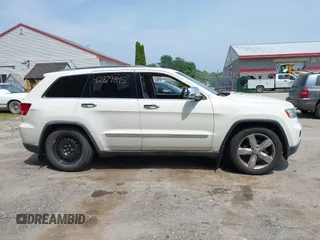 2011 Jeep Grand Cherokee Overland with VIN 1J4RR6GG3BC587857, listed as a IAAI auction lot 42879845 with 165,572 mi miles and . Bid and sale history available at DreamBid. Image 13.