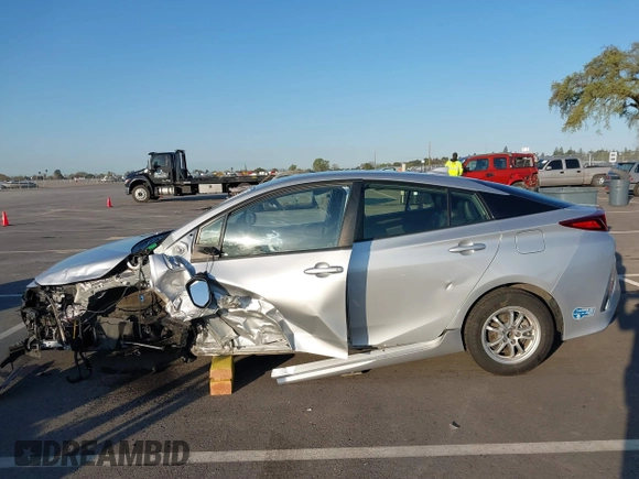 2021 Toyota Prius LE with VIN JTDKAMFP1M3196066, listed as a IAAI auction lot 41752179 with 90,200 mi miles and . Bid and sale history available at DreamBid. Image 15.