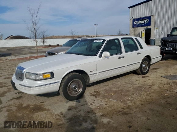 1997 Lincoln Town Car Signature z VIN 1LNLM82W1VY673577, wystawiony jako Copart lot #49160595 z przebiegiem 221 129 mil mil oraz Nie do naprawy • Non repairable. Historia ofert i sprzedaży dostępna na DreamBid. Obrazek 1.