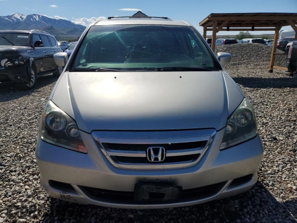 2007 Honda Odyssey EX-L z VIN 5FNRL38647B028078, wystawiony jako Copart lot #56208005 z przebiegiem 192 000 mil mil oraz Szkoda całkowita • Salvage title. Historia ofert i sprzedaży dostępna na DreamBid. Obrazek 5.