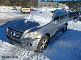 2011 Mercedes-Benz GL-Class GL 450 with VIN 4JGBF7BE3BA700323, listed as a IAAI auction lot 41586109 with 165,457 mi miles. Bid and sale history available at carsss.com. Image 2.