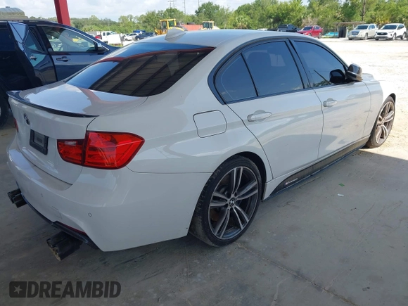 2015 BMW 3 Series 335i with VIN WBA3A9C57FK472521, listed as a IAAI auction lot 42672174 with Not provided miles and . Bid and sale history available at DreamBid. Image 4.