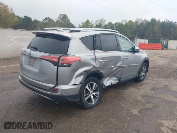 2018 Toyota RAV4 XLE with VIN 2T3WFREV3JW445654, listed as a IAAI auction lot 40849666 with 69,365 mi miles and . Bid and sale history available at DreamBid. Image 4.