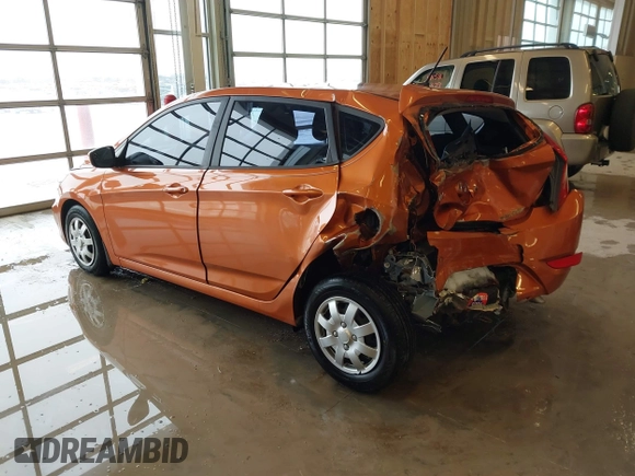 2015 Hyundai Accent GS with VIN KMHCT5AE6FU211955, listed as a IAAI auction lot 41610857 with 106,497 mi miles. Bid and sale history available at carsss.com. Image 3.