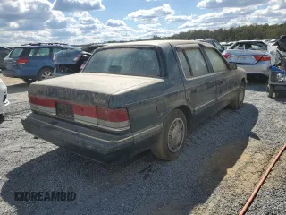 1993 Plymouth Acclaim z VIN 1P3XA4634PF673210, wystawiony jako Copart lot #75919254 z przebiegiem 186 440 mil mil oraz Szkody całkowita. Historia ofert i sprzedaży dostępna na DreamBid. Obrazek 3.