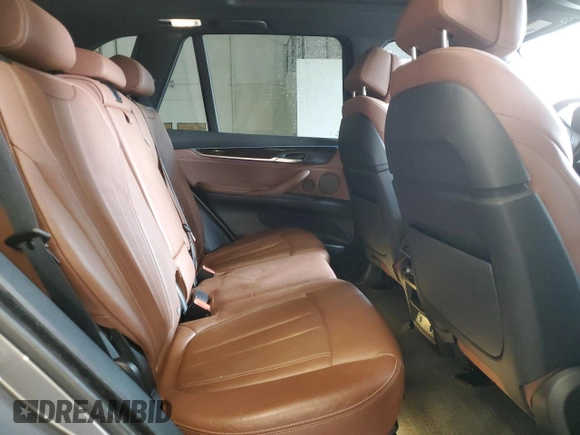 2017 BMW X5 xDrive50i z VIN 5UXKR6C35H0U12982, wystawiony jako Copart lot #57163565 z przebiegiem 121 906 mil mil oraz Szkoda całkowita • Salvage title. Historia ofert i sprzedaży dostępna na DreamBid. Obrazek 11.
