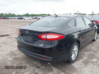 2015 Ford Fusion SE with VIN 1FA6P0HD9F5113069, listed as a IAAI auction lot 42126855 with 122,969 mi miles. Bid and sale history available at carsss.com. Image 4.