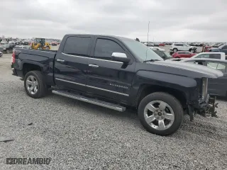 2015 Chevrolet Silverado 1500 LTZ with VIN 3GCUKSEC9FG418863, listed as a Copart auction lot 45115165 with 140,398 mi miles and Salvage Title. Bid and sale history available at carsss.com. Image 4.