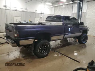 1999 Dodge 2500 with VIN 3B7KF2364XG164022, listed as a Copart auction lot 41523525 with 182,334 mi miles and Salvage Title. Bid and sale history available at carsss.com. Image 3.